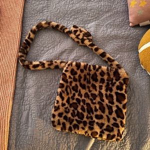 Fuzzy cheetah print purse